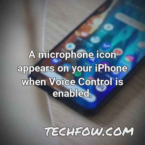 a microphone icon appears on your iphone when voice control is enabled