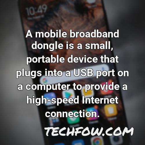 a mobile broadband dongle is a small portable device that plugs into a usb port on a computer to provide a high speed internet connection
