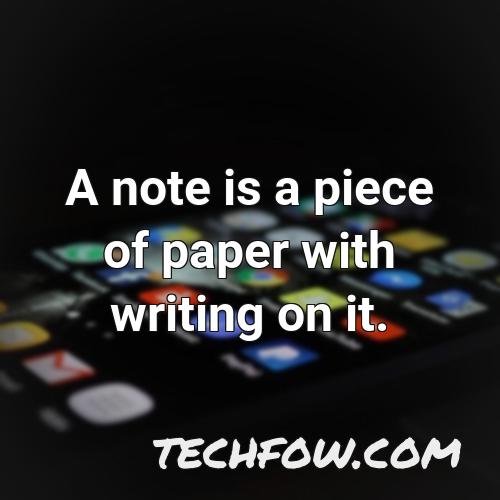 a note is a piece of paper with writing on it