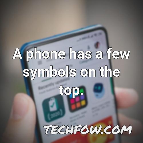 a phone has a few symbols on the top