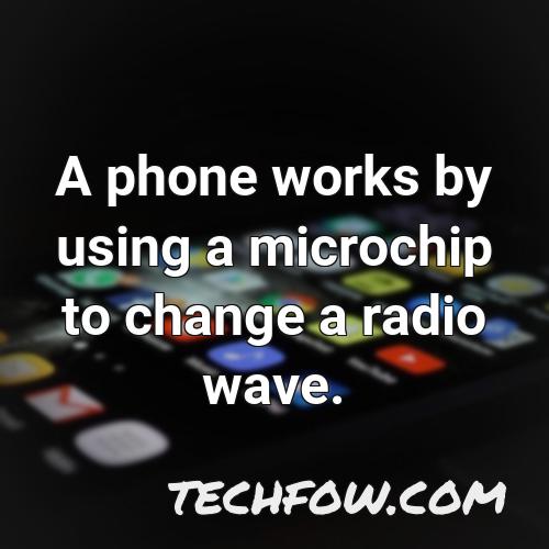 a phone works by using a microchip to change a radio wave