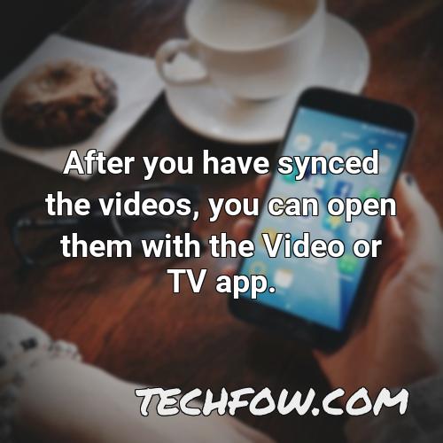 after you have synced the videos you can open them with the video or tv app
