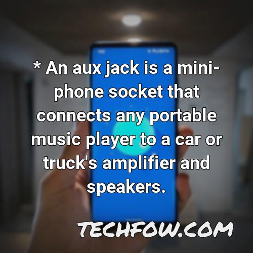 an aux jack is a mini phone socket that connects any portable music player to a car or truck s amplifier and speakers