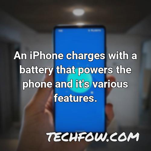an iphone charges with a battery that powers the phone and it s various features