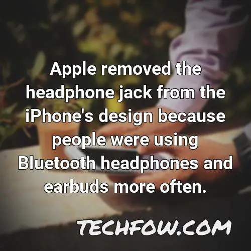apple removed the headphone jack from the iphone s design because people were using bluetooth headphones and earbuds more often 1