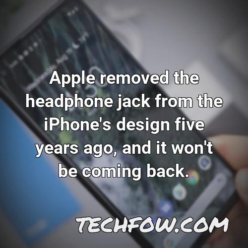 apple removed the headphone jack from the iphone s design five years ago and it won t be coming back 5