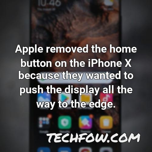 apple removed the home button on the iphone x because they wanted to push the display all the way to the edge