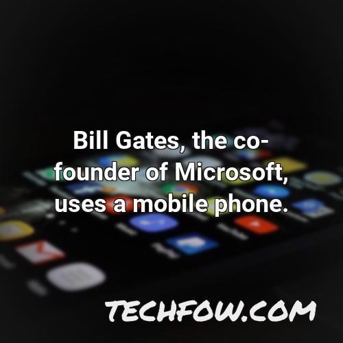 bill gates the co founder of microsoft uses a mobile phone