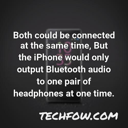 both could be connected at the same time but the iphone would only output bluetooth audio to one pair of headphones at one time