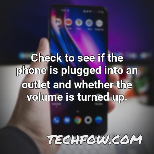 check to see if the phone is plugged into an outlet and whether the volume is turned up