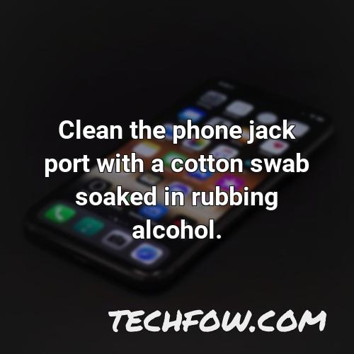 clean the phone jack port with a cotton swab soaked in rubbing alcohol