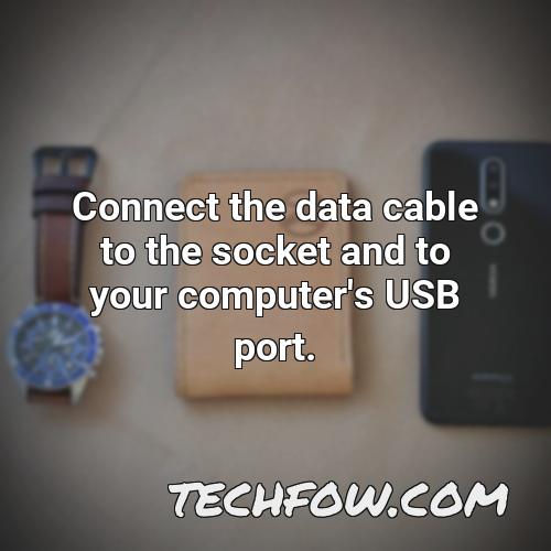 connect the data cable to the socket and to your computer s usb port