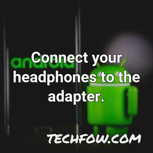 connect your headphones to the adapter 2