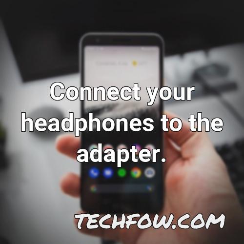connect your headphones to the adapter 4
