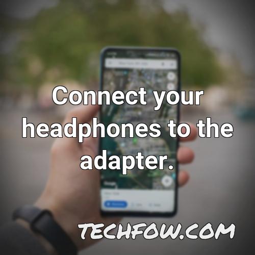 connect your headphones to the adapter 9