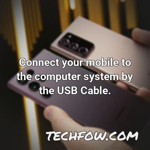 connect your mobile to the computer system by the usb cable