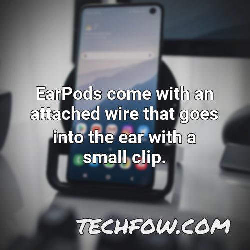 earpods come with an attached wire that goes into the ear with a small clip
