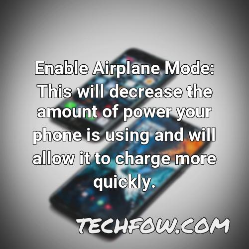 enable airplane mode this will decrease the amount of power your phone is using and will allow it to charge more quickly
