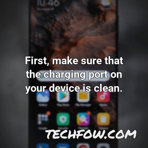 first make sure that the charging port on your device is clean