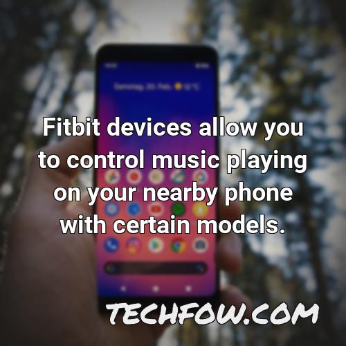 fitbit devices allow you to control music playing on your nearby phone with certain models