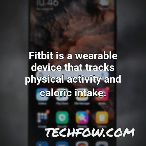 fitbit is a wearable device that tracks physical activity and caloric intake