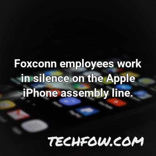 foxconn employees work in silence on the apple iphone assembly line