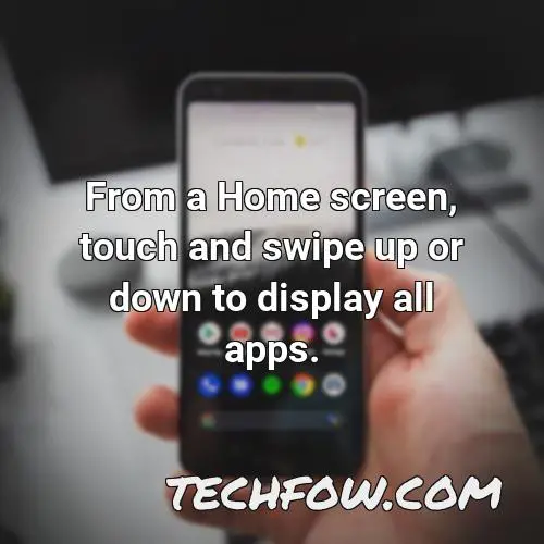 from a home screen touch and swipe up or down to display all apps
