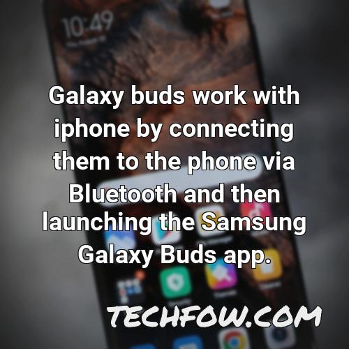 galaxy buds work with iphone by connecting them to the phone via bluetooth and then launching the samsung galaxy buds app