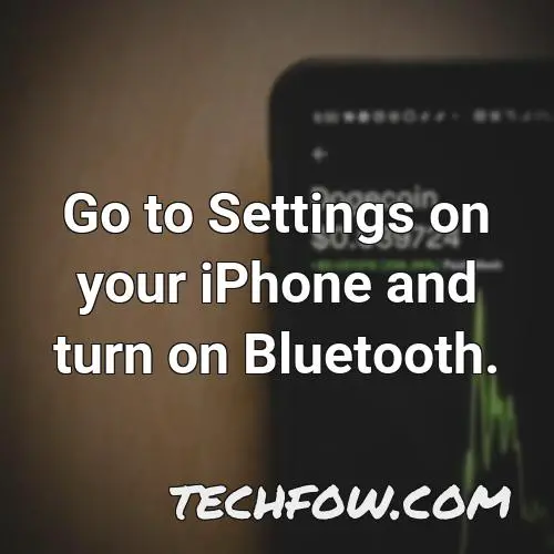 go to settings on your iphone and turn on bluetooth