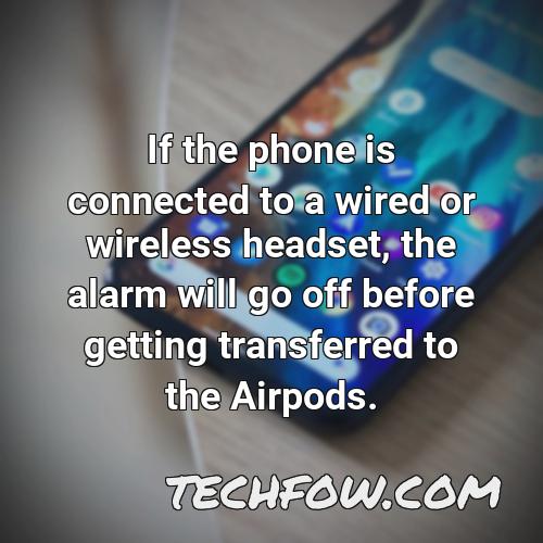 if the phone is connected to a wired or wireless headset the alarm will go off before getting transferred to the airpods