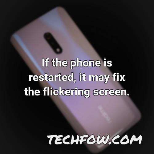 if the phone is restarted it may fix the flickering screen