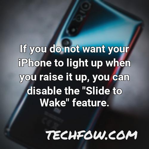 if you do not want your iphone to light up when you raise it up you can disable the slide to wake feature