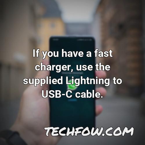 if you have a fast charger use the supplied lightning to usb c cable
