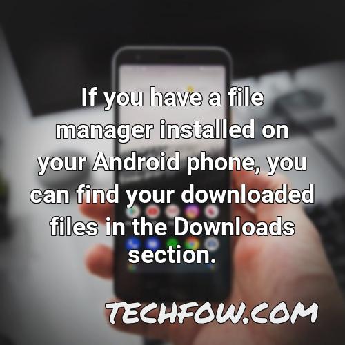 if you have a file manager installed on your android phone you can find your downloaded files in the downloads section