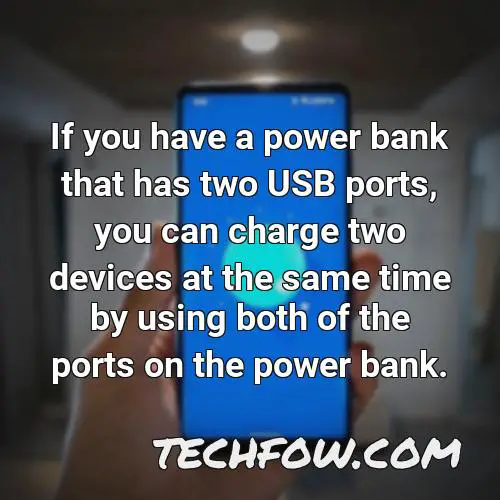 if you have a power bank that has two usb ports you can charge two devices at the same time by using both of the ports on the power bank