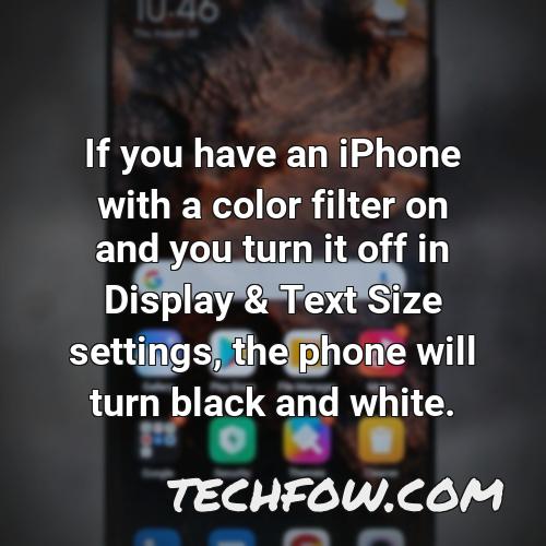 if you have an iphone with a color filter on and you turn it off in display text size settings the phone will turn black and white
