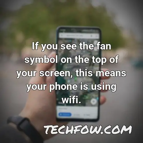 if you see the fan symbol on the top of your screen this means your phone is using wifi