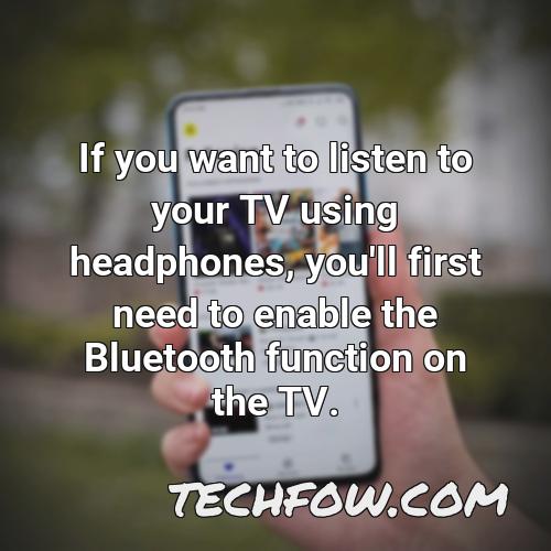 if you want to listen to your tv using headphones you ll first need to enable the bluetooth function on the tv