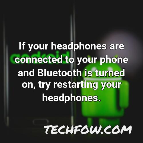 if your headphones are connected to your phone and bluetooth is turned on try restarting your headphones
