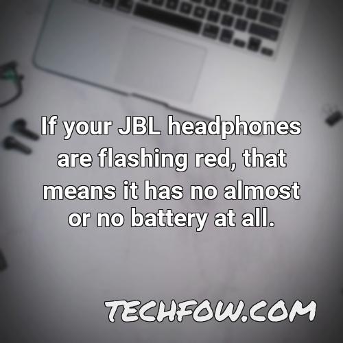 if your jbl headphones are flashing red that means it has no almost or no battery at all