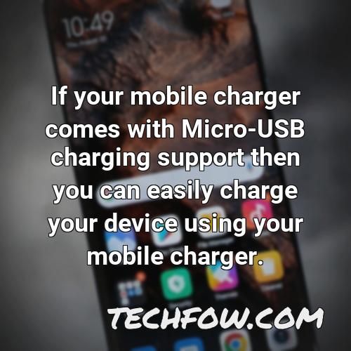 if your mobile charger comes with micro usb charging support then you can easily charge your device using your mobile charger