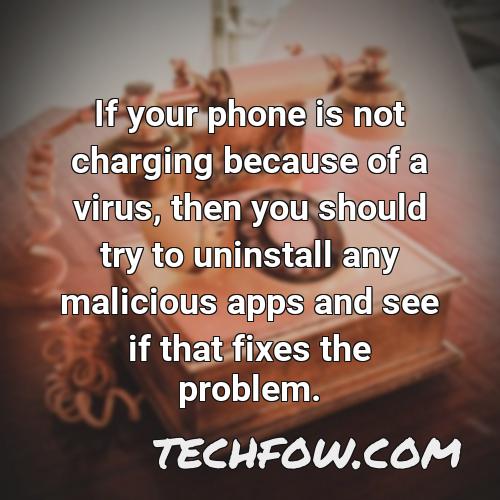 if your phone is not charging because of a virus then you should try to uninstall any malicious apps and see if that fixes the problem