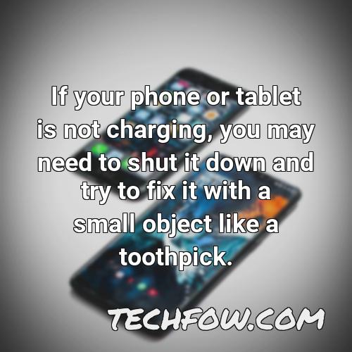 if your phone or tablet is not charging you may need to shut it down and try to fix it with a small object like a toothpick