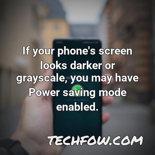 if your phone s screen looks darker or grayscale you may have power saving mode enabled 1