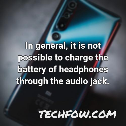 in general it is not possible to charge the battery of headphones through the audio jack