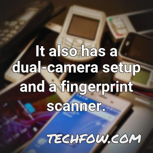 it also has a dual camera setup and a fingerprint scanner
