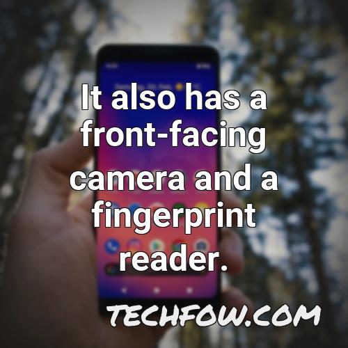 it also has a front facing camera and a fingerprint reader