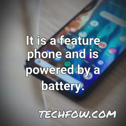 it is a feature phone and is powered by a battery