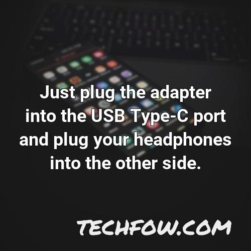 just plug the adapter into the usb type c port and plug your headphones into the other side