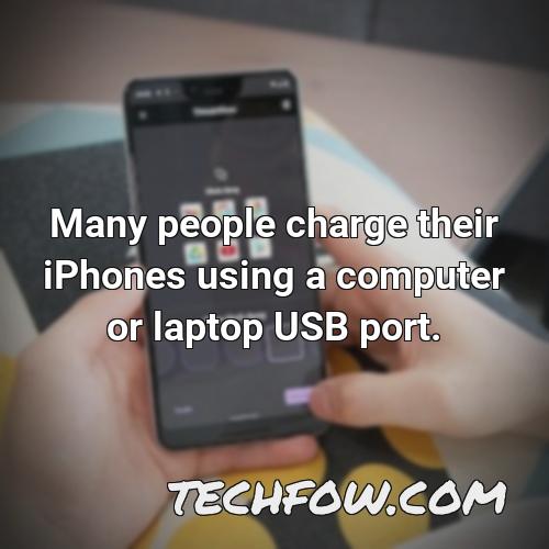 many people charge their iphones using a computer or laptop usb port